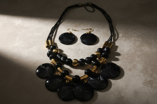 Black and gold jewelry set lifestyle photography